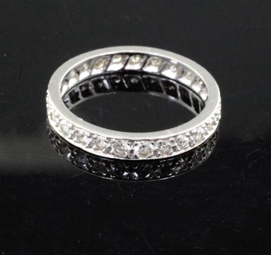 A platinum? and diamond full eternity ring, size N.